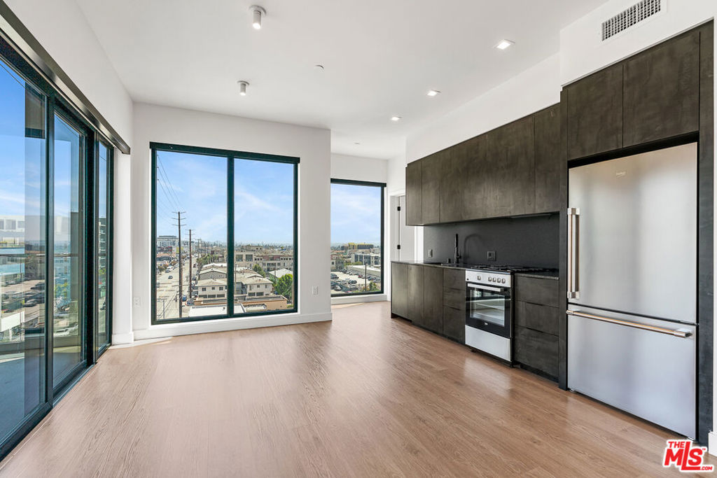 Welcome to Arya, Located in the Palms/Culver City neighborhood. Residence 502 is a corner 2x2, with views facing South East towards the city. Kitchen has dark finishes with granite countertops, stainless steel appliances including dishwasher, fridge, and gas oven/stove. Residence includes custom closets in the bedrooms including a walk-in closet, electronic blackout window shades, nest thermostat, and smart lights. Private balcony off of the living room. Property uses Latch OS for smart access using your phone. Property amenities include fitness center with Technogym Equipment, co-working lounge, conference room, and a spacious rooftop with 2 BBQs, games, and beautiful city views. Parking is available at $150/month for a single space, and Internet is $84/month. Additional parking available off-site. Contact us today to schedule your tour!