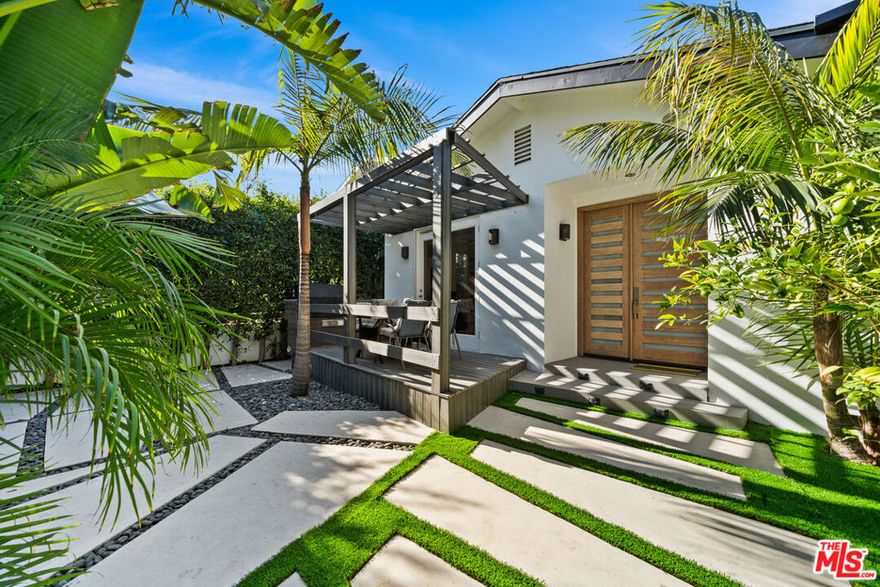 This beautifully updated single-family residence offers approx. 2,800 sq. ft. of indoor-outdoor living, featuring 3 bedrooms and 3.5 bathrooms in the main house plus a 1 bed/1 bath ADU guest house above the garage. The open floor plan includes a chef's kitchen with premium appliances, spacious living and dining areas, and fully remodeled bathrooms. Enjoy true California living with seamless flow to the private backyard, complete with outdoor kitchen, expansive patio, large swimming pool and spa. The guest house offers its own kitchenette and living space perfect for visitors, office, or studio. Additional highlights include solar panels, updated systems, and proximity to LA's best shopping, dining, and conveniences. A modern entertainer's dream in one of Los Angeles' most desirable neighborhoods available for a 12-month lease, furnished or unfurnished. Offered unfurnished at list price or furnished at the monthly rent of $14,050. Security deposit is equal to one month's rent.