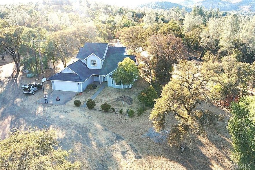 Escape to your private property in Bangor! This captivating two-story home is located on 10 acres. Equiped with a large new shop for your equipment and storage needs, horse stalls, and is fenced and cross fenced, creating a safe and functional environment for yourself and animals.  Adding to the property's incredible value is a large array of owned solar to run the home and property and keep your costs down.

Step inside your home and discover all this comfortable home has to offer: an updated kitchen boasting sleek granite countertops, stylish painted cabinets, and ample counter space for all your culinary endeavors. Seamlessly flowing from the kitchen, the dining area features convenient built-in cabinets, perfect for storage or showcasing your favorite treasures.  Just past the dining room is the inside laundry room conveniently located just inside the attached two-car garage.

Unwind in the inviting living room, where a built-in fireplace with soaring ceilings creates a cozy and elegant atmosphere, ideal for entertaining or relaxing evenings at home. A versatile bonus room, attached to the dining area, offers endless possibilities, easily transforming into a functional mudroom, a dedicated tack area, a bright sunroom, or a productive home office.

Experience the convenience of single-level living with a spacious primary bedroom located downstairs. This serene retreat features a luxurious en-suite bathroom, complete with a generous walk-in closet, a spa-like soaking tub for ultimate relaxation, and a refreshing separate shower.

Upstairs, two comfortable bedrooms provide picturesque views of the surrounding property, offering a tranquil haven. A well-appointed guest bathroom with a tub and overhead shower caters to the needs of family and guests alike. 

This exceptional Bangor home offers a unique opportunity to embrace a lifestyle of comfort, and versatility. Don't miss your chance to make it yours! Schedule your private showing today.