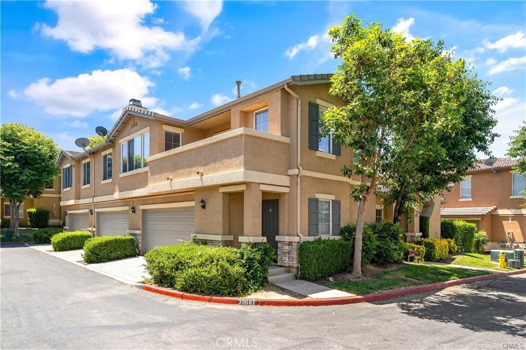 Opportunity awaits you to lease this beautiful 3BR, 2 BA condominium centrally located in the heart of Murrieta! Don't miss out on the chance to call this wonderful corner unit at The Villas at Old School your very own. The open concept living room, kitchen, and dining room are flooded with natural light, and the balcony is perfect for soaking up the sun or enjoying stunning sunset views. With a two-car attached garage and over 1400+ sq/ft of comfortable living space, this home has everything you need. The kitchen is equipped with stainless steel appliances, modern charcoal cabinets, and ample storage. The spacious master bedroom boasts an abundance of natural light, a large walk-in closet, and a master bath with a dual vanity, private commode, and plenty of space. You'll also love the large laundry room with a folding area, deep wash sink, and high-end LG washer & dryer. Conveniently located to nearby grocery stores, parks, schools, freeways, and other amenities, this home is truly a gem. Don't miss out on this incredible opportunity!