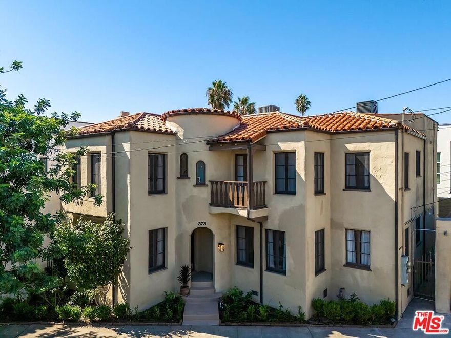 This inviting Spanish lower duplex blends historic character with modern upgrades offering warmth, space, and timeless style in a truly unbeatable location.  Features include spacious living room with windows on all sides and a working fireplace, formal dining room, breakfast area, stainless steel wi-fi enabled kitchen appliances, separate laundry room with washer/dryer, central heat and a/c, and free EV outlet  installation available upon request.  Near the Grove, trendy restaurants, cafes, shops, and medical offices, all  very close and convenient.  Ready to move into now !