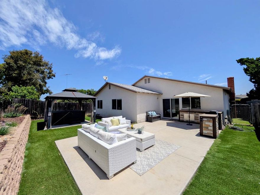 Discover your dream home in North Mira Mesa! Nestled on a quiet and private street in North Mira Mesa, this light-filled, single-story home is a true gem, ready for you to make it your own. The heart of this residence is its spacious kitchen, thoughtfully appointed with gleaming quartz countertops, top-of-the-line stainless steel appliances, and a versatile 5-burner cooktop—making it a chef's delight and an entertainer's dream. Inside, comfort meets style with new luxury vinyl plank flooring throughout, contemporary recessed lighting, and an inviting fireplace in the living room. A separate laundry room adds practicality, while recent upgrades including a brand new roof and solar panels promise lower utility bills and long-term value. Step outside to your private oasis: the fully fenced backyard featuring a spa, built-in outdoor kitchen, and a tranquil ambiance perfect for relaxation or entertaining. The charming front courtyard further blurs the lines between indoor and outdoor living while beautifully landscaped for peace, quiet, and privacy. Located just a short walk from the neighborhood park, scenic trails and Ericson Elementary School, you're also minutes from Mira Mesa Recreation Center, shopping, dining, and freeway access. Don't miss your chance to own this meticulously maintained home in a desirable Mira Mesa neighborhood – it's ready for you to move in and make it your own.