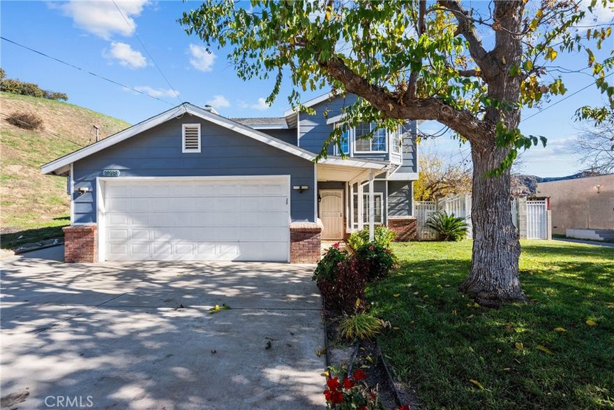 Welcome home to this sprawling two story residence perfectly positioned on a prime corner lot with no direct neighbors, offering exceptional privacy and an open, airy atmosphere. Thoughtful upgrades and charming details flow throughout, creating a warm and welcoming environment from the moment you walk inside. Featuring three spacious bedrooms, including a beautifully remodeled primary suite, this home offers comfort and flexibility for a variety of lifestyles. The layout boasts both separate living room and family room, ideal for entertaining, relaxing, or creating distinct spaces for work and play. At the heart of the home, an inviting brick fireplace and beautiful wood work that adds timeless character and cozy ambiance. The upgraded touches throughout elevate the homes style while maintaining a sense of comfort and charm. Step outside to discover a gorgeous backyard, thoughtfully designed for both relaxation and outdoor enjoyment. Upgrades and updates include A/C, furnace and ducts, tankless water heater, roof is approx. 10 years old, New leased Solar system, outlets and switches, garage door opener with battery backup, Backyard concrete, synthetic grass, and expanded the driveway to fit 3 cars! You can feel the love and care this home has!