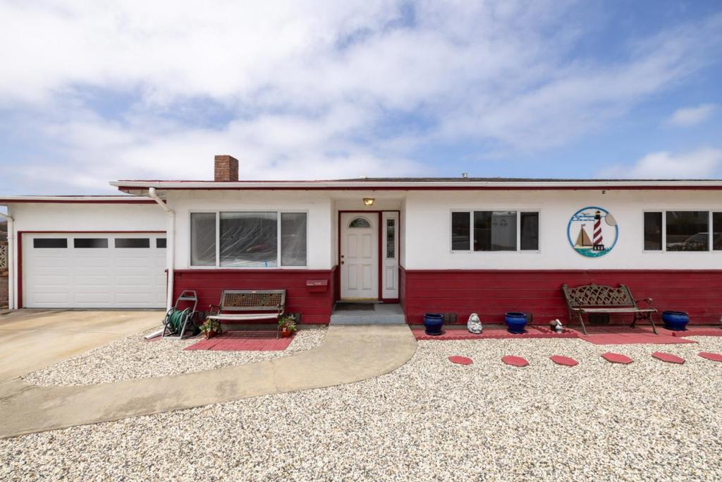 Step into serenity with this charming single-level home boasting breathtaking panoramic views of Monterey Bay. Imagine starting your mornings with coffee at the kitchen table while the sun rises over the water, or unwinding in the evening as the sky turns a warm golden hue.This freshly painted, three-bedroom, one and a half bath home offers timeless appeal with hardwood floors, a spacious layout, and a welcoming atmosphere throughout. The updated two-car garage adds convenience and style, while the expansive backyard invites endless possibilitiesfrom family barbecues to outdoor play, or even your dream hot tub retreat under the stars. Located in the desirable Upper Seaside neighborhood, this home is the perfect blend of location, comfort, and coastal beauty. Come experience why this Monterey Bay gem feels just like home.