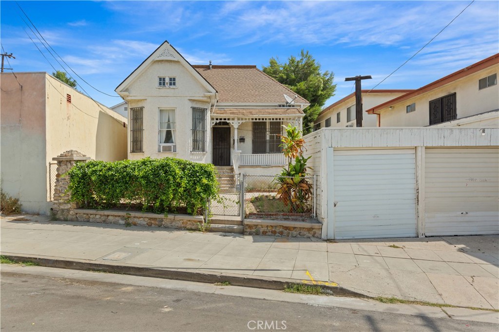 Discover an outstanding triplex income property at 1037 Alpine Street, nestled in highly sought-after Los Angeles Echo Park/ Victor Heights area. This unique investment offers two 1 bed, 1 bath Units in the front and a separate 4 bed, 2 bath units in the back with 4 single parking garages. Income Potential: With three units, this property presents an excellent opportunity to generate substantial rental income, making it an investor's dream or a homeowner's savvy investment. Both units includes an expansive basement and a peaceful center courtyard surround by tall trees. Property is zoned as C1 with potential for mix-use commercial and residential use. Location: Enjoy unparalleled convenience with trendy restaurants, cultural attractions, premier shopping centers, and entertainment options all within easy reach. This prime location places you near iconic landmarks such as Dodger Stadium, Echo Park, and the vibrant Chinatown district. Walking distance to the famous East Side Italian Deli and upcoming Alpine Bungalow with it's new shops and businesses. Don't miss out on this rare find! Seize the opportunity at 1037 Alpine Street in prime Los Angeles.