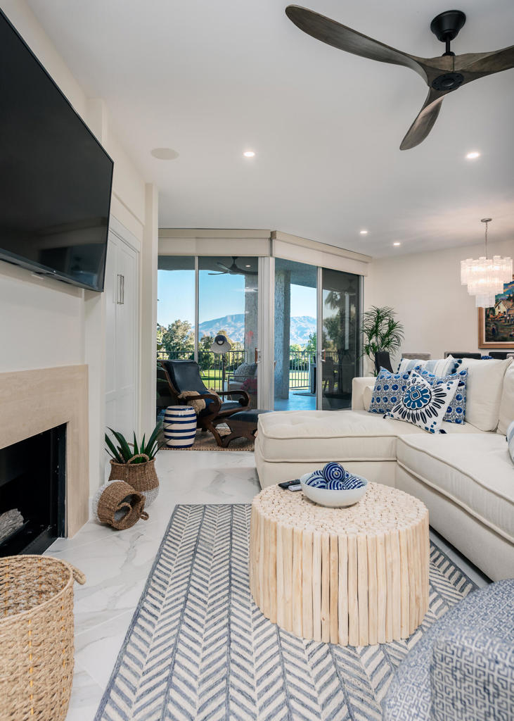 Welcome to this beautifully remodeled condo located in the charming community of Desert Island. Featuring 2 bedrms, 2 bathrms, this condo offers a modern & open concept design that is sure to impress.Step inside and immediately notice the stunning porcelain marble-look tile flooring that flows throughout the main living areas onto the balcony. The kitchen is a chef's dream, with its sleek waterfall edge counters & luxurious marble countertops. Custom lighting and audio equipment & installed throughout, offering full control for a home automation system.The living room is spacious & inviting, with 2 twin wall beds for added convenience. The primary bedroom boasts a walk-in closet & a remodeled en suite bathroom, complete with a large soaking tub & a separate shower featuring marble countertops.This community has it all. Surrounded by a beautiful lake and an 18-hole championship golf course, residents can enjoy picturesque views while taking leisurely walks along the walking paths. Fruit trees, benches, tennis courts, heated swimming pools, spas, pedal boats, and fishing spots provide endless entertainment options.For added security and convenience, there is a 24-hour gate entry. The location of this condo is a dream, with its central proximity. Near Disney's Cotino Story Living & the River in Rancho Mirage. You'll find plenty of eateries, including the new Dave & Buster's, Escape Games, as well as a super charging station.Don't miss out on this opportunit