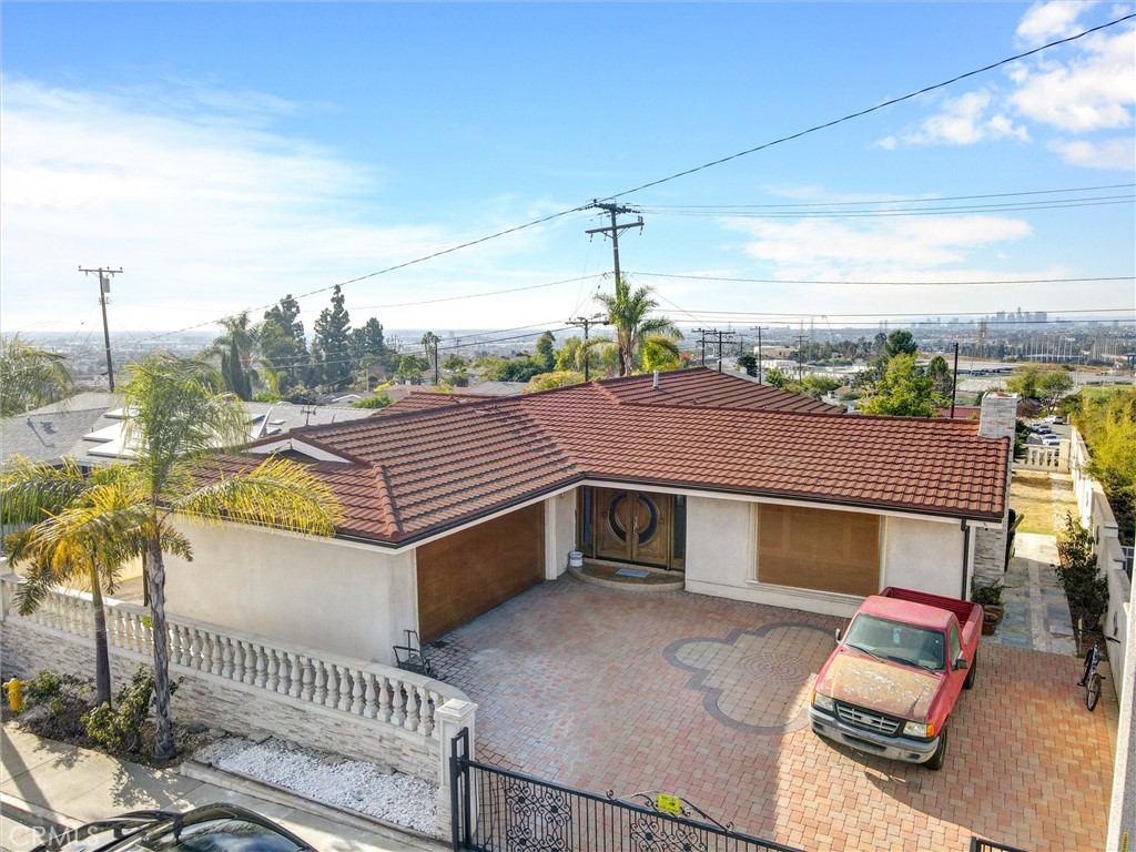 Gorgeous home in the highly sought out area of North Montebello. Features new kitchen, new Marvin windows, crown moldings exquisitely done. Includes new Marble flooring. New walnut flooring in all three bedrooms have been done stylishly and elaborately. Includes new driveway, and carefully paved pathway around the house. Beautiful views of downtown skyline. No cost was spared to add new high lites and features to this home. Move-in condition. This house needs to be seen in order to appreciate it's beauty!