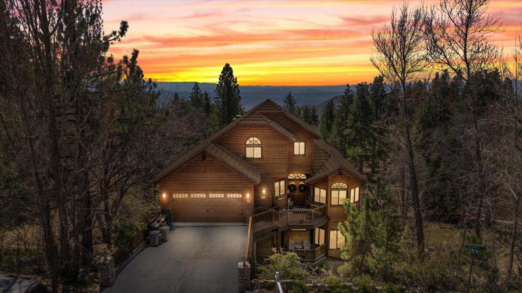 Custom Architectural Gem with Forest Views - 4 Bed, 3 Bath + Offices, Library & More! Welcome to your dream home nestled against the breathtaking backdrop of the San Bernardino National Forest. Custom-designed and built by the current owners in collaboration with renowned architect John Zane, this one-of-a-kind property offers the perfect balance of luxury, comfort, and functionality. From the moment you step inside, you're greeted by soaring ceilings and expansive, floor-to-ceiling windows that flood the space with natural light and offer uninterrupted views of the forest. The open-concept design seamlessly blends modern living with the serenity of nature. The attached 2-car garage provides lots of parking and additional storage. Outside, you'll find a custom-built treehouse, creating a magical retreat for kids or a tranquil reading spot among the trees. The professionally landscaped front yard features automatic sprinklers, while other areas a drip irrigation system ensures low-maintenance care for garden beds and outdoor plants. This home is a rare opportunity to own a custom, architect-designed sanctuary with unmatched views and every amenity you could ask for. Offered for the first time, this extraordinary home has been lovingly owned by the same family forover 30 years and is now ready to welcome its next chapter.