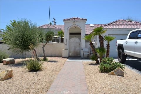 Photo of 31811 Whispering Palms Trail, Cathedral City, CA 92234 (MLS # TR25140593)