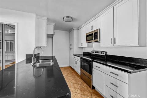 Photo of 5334 Lindley Avenue #319, Encino, CA 91316 (MLS # SR26104582)