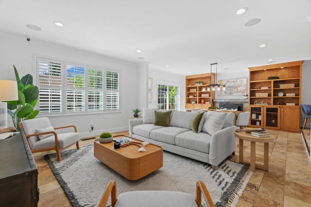 Welcome to 5749 San Lorenzo Drive, an inviting single-story home nestled in the desirable Blossom Valley area of San Jose within walking distance to grocery stores, restaurants & VTA station. This 4 bedroom, 2 bathroom retreat offers 1,593sq ft of cozy living space on a beautifully landscaped 6,800 sq ft lot. Enjoy modern comforts including a new Carrier Energy- Efficient Heat pump HVAC system, Smart Thermostat, 7.1 Built-in Speaker Systems in living area, newly painted interior, new carpets, and recessed lighting. The kitchen boasts a professional Bertazzoni 5 burner range, Ancona Range Hood, Samsung Smart refrigerator, and Bosch dishwasher. Relax with friends and family out on the Trex deck and patio, listen to your favorite music through the Yamaha outdoor speakers, find zen in the eye-catching waterfall feature, or stroll through the gardens teeming with fruit trees and flowering plants. The home comes with a low maintenance whole house water purifier, security cameras, smart sprinkler systems, plantation shutters, and finished garage with overhead storage. Minutes away are Cahalan and Foothill Parks, Westfield Oakridge Mall, Boulder Ridge Golf Club as well as commuter routes 85, 87, and 101. Dont miss out!