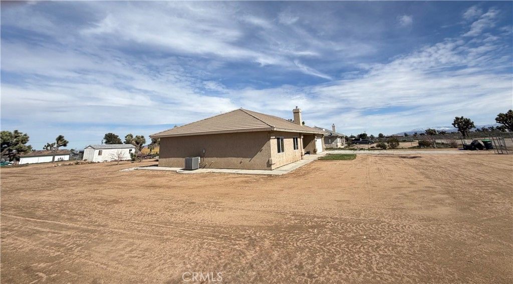 Photo of 8720 Greasewood Lane, Victorville, CA 92392 (MLS # HD26038330)