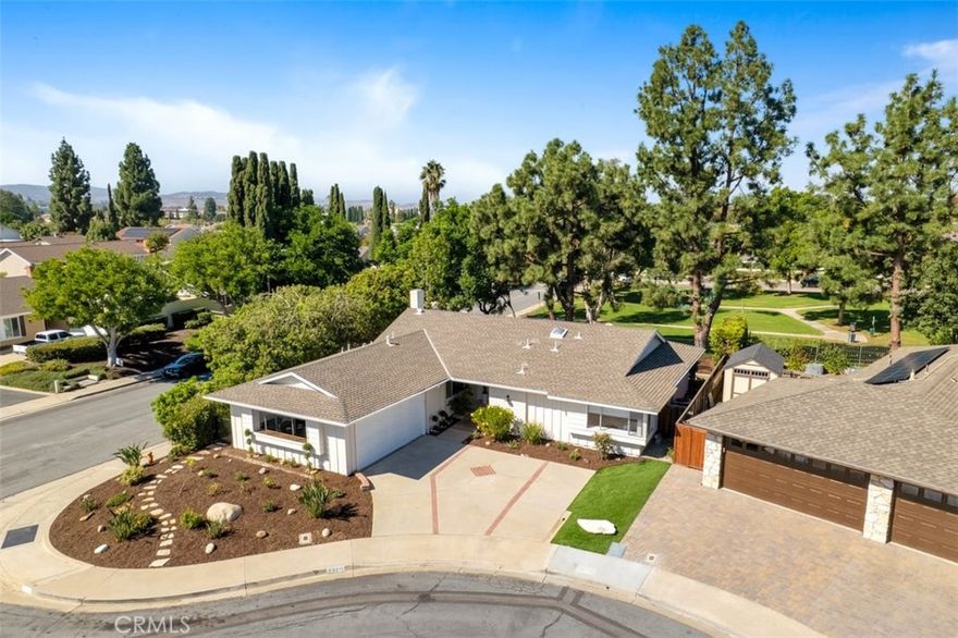 ONLY ONE NEIGHBOR, BACKS TO A PARK! Fabulous single story, mountain-view property on a corner lot. This former model home has not been offered for sale since this family bought it from the builder! One of just a few homes located on a short cul-de-sac that backs to Veterans Park! The curb appeal will knock your socks off and the access to the City Park creates privacy and the feel of living on a private estate! Home features double door entry and a spacious 2 car garage with fresh paint and direct access, plus a large driveway. Inside you will discover a dedicated laundry room, huge open kitchen with granite counters and plenty of storage. Large family room has smooth ceilings, a red brick fireplace and newer slider that opens up to a private rear yard with greenbelt and mountain views. Huge, covered patio in back yard is perfect for entertaining, the homes serenity is extended by the adjacent greenbelt and Veteran's Park. Veterans Park is almost 5 acres large plus a one-acre pond and was just updated by the city. Plenty of additional yard space for gardening and fresh plants and landscaping in the front and rear yards to enjoy. Guest bathroom has a huge skylight that bathes the room in daylight, and there is a 3rd bathroom by the laundry area. Newer central air conditioning and furnace to keep you comfortable year-round. Walking distance to everything, shopping, restaurants, hiking and biking trails and so much more. Located in a very quiet neighborhood surrounded by other homes that also show a pride of ownership. Home has access to the Beach & Tennis Club that offers a Jr. Olympic swimming pool, a smaller north pool, a children's wader, beach and swim lagoon, five tennis courts, one Pickleball court, two half-court basketball courts, a sand volleyball court, fitness center, preschool, Lake View Lounge, two pool tables and shuffleboard. The fitness center includes four - Star Trac Pro Treadmills, 2 elliptical machines, a Star Trac Pro Recumbent bike, a Hoist multi-unit system with new bench, a Smith machine and new dumbbells, plate tree and so much more.
