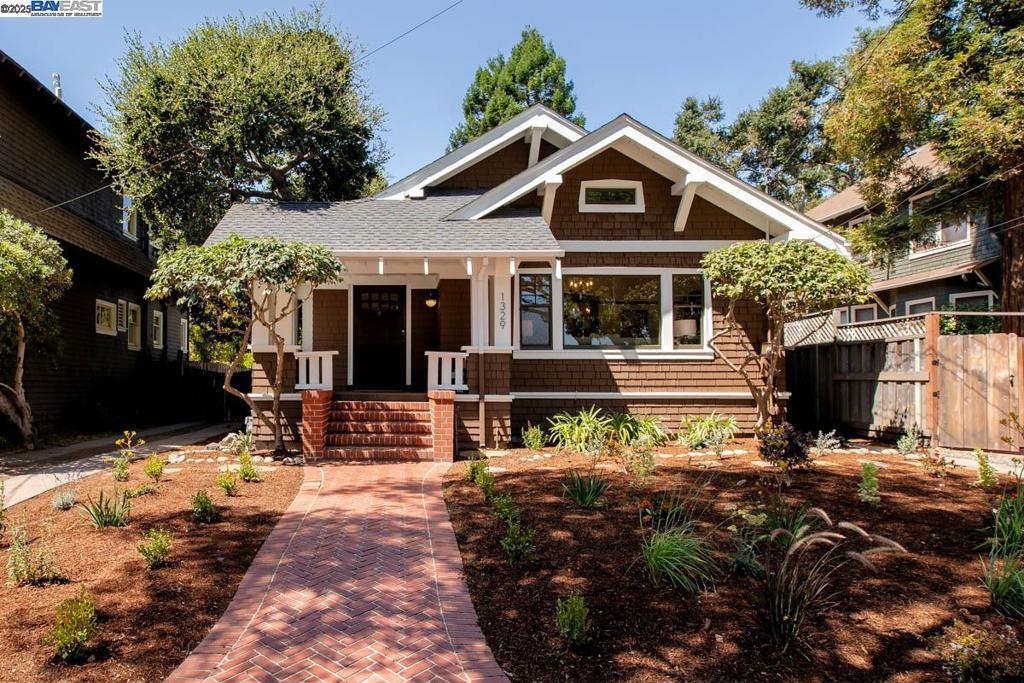 Located in the East End on a picturesque block lined with trees and gorgeous vintage homes, this authentic 1911 Craftsman features 2BR,1BA, a formal LR, DR, and an eat-in kitchen in the primary home, plus a 2-story detached structure with a lower level garage/workshop (569 SF, measured) and an upper level studio/home office complete with an ensuite full bathroom (406 SF, measured). The main home's interior features beautifully preserved architectural details including Douglas fir wainscot paneling & door/window trim, hardwood floors, 9-foot coved ceilings, picture + plate rails, vintage doors/hardware, original built-in cabinets and a dramatic stone & brick fireplace. There's even a custom umbrella holder built into a seating bench in the formal foyer! The home has a newly remodeled bathroom, newly updated kitchen, fresh interior paint and refinished floors. The detached garage/studio offers many flexible options and/or conversion possibilities. The exceptionally large, private lot (7,450 SF) has a great entertaining deck and lovely backyard with a lawn plus new + mature landscaping. A long driveway provides plenty of parking. Convenient East End location with easy access to parks, top schools and shopping. Very special!