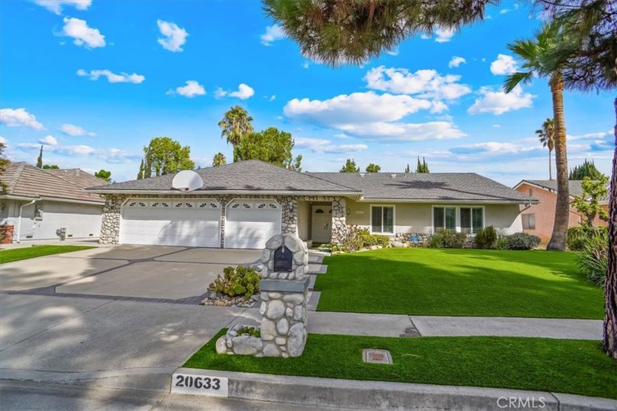 Curb Appeal and Entertainer’s Paradise! Nestled on a quiet cul-de-sac in one of Chatsworth’s most desirable neighborhoods, this light filled single story pool home offers the perfect blend of comfort, style, and outdoor living. With 4 bedrooms, 2.5 bathrooms, and over 2,300 sq. ft. of living space on an expansive 11,000 sq. ft. lot, this home is designed for both everyday living and unforgettable entertaining. Step inside to find a warm, inviting interior featuring hardwood floors, smooth ceilings, recessed lighting, plantation shutters, dual-pane windows, and newer central air & heating for year-round comfort. The spacious family room boasts a cozy stone fireplace and a wet bar, with sliding glass doors that open directly to your private backyard oasis. A true showstopper? The resort-style grounds are meticulously landscaped for low maintenance and maximum beauty, the backyard features a stunning pool and spa, completely redone approximately 5 years ago. A large covered patio provides the ideal space for dining al fresco, relaxing in the shade, or hosting weekend gatherings with friends and family. The private primary suite is a serene retreat with its own sitting area, walk-in closet, and en suite bathroom complete with dual sinks, a soaking tub, and a separate shower. All this, just minutes from top-rated schools, shopping and dining at The Vineyards in Porter Ranch, parks, hiking trails, and easy freeway access. Don’t miss the opportunity to own this wonderful Chatsworth home where comfort meets California living at its finest.