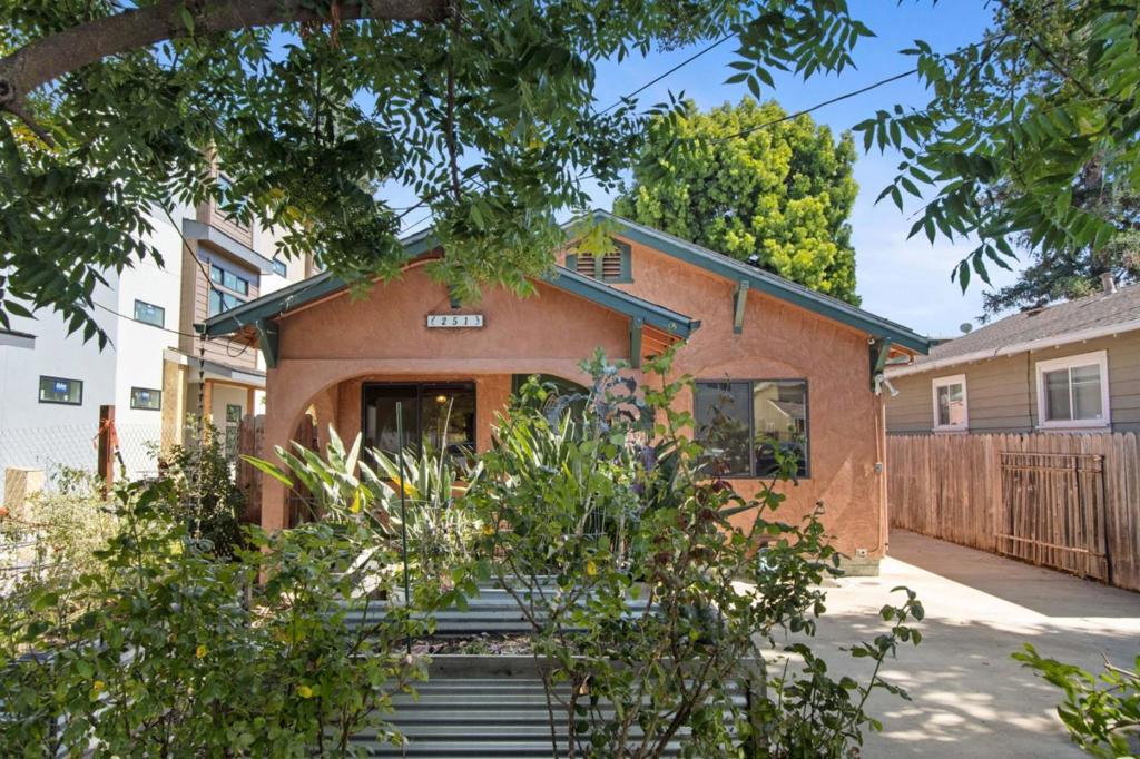 Stylish Mediterranean bungalow located in the highly sought after Woodside Plaza neighborhood. This charming two bedroom/one-bathroom well-maintained home presents excellent potential for investors or first-time buyers looking for their first home purchase. Located within walking distance of downtown Redwood City, this home features a cozy layout with great natural light, hardwood floors, a spacious living area, and a functional kitchen with granite countertops and maple cabinets. Relax and enjoy that morning cup of coffee in the spacious combination family/dining room. Two large bedrooms and an updated bath round out the main living area. A spacious light filled backyard features plenty of room to entertain along with beautiful planter boxes perfect for growing vegetables and herbs. A converted garage provides an extra space for office, workout room or extra bedroom. Conveniently located close to major transportation routes, great shopping/ dining, and award winning Redwood City schools.