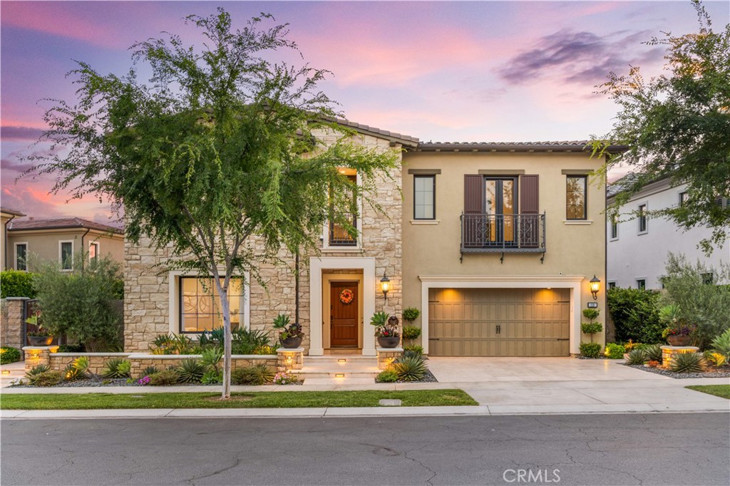 Discover exceptional design and functionality in this elegant Toll Brothers estate, located in the prestigious 24-hour guard-gated community of Altair Irvine. This thoughtfully upgraded 5-bedroom, 5.5-bathroom home offers approx. 5,340 square feet of refined living space on one of the most prominent lots on the street, offering impressive curb appeal and a wide frontage.
A grand entry welcomes you into a light-filled interior with a seamless indoor-outdoor connection. The main level features an open-concept great room with expansive sliding glass doors and four convenient access points connecting the home to the yard, enhancing flow and flexibility. The gourmet kitchen is equipped with premium Wolf and Sub-Zero appliances, a walk-in pantry, and a large center island. A separate prep kitchen offers additional space for culinary needs, ideal for hosting or daily cooking routines.
Enjoy your morning coffee in the dining area while taking in sweeping mountain views, setting a tranquil tone for the day. The professionally designed backyard includes a private putting green, a tranquil waterfall feature, and multiple areas for entertaining and relaxation. The soft water system and other thoughtful upgrades elevate everyday comfort.
Upstairs, the luxurious primary suite boasts a spa-inspired bathroom with soaking tub, oversized shower, dual vanities, and walk-in closets. Three secondary ensuite bedrooms and a spacious loft complete the upper level. A main-floor guest suite provides added convenience.
Residents of Altair enjoy access to world-class amenities including resort-style pools and spas, tennis and sports courts, clubhouses, parks, and trails. Zoned for award-winning Irvine Unified schools, and conveniently located near Portola High School, Cadence Park, Irvine Spectrum, and the Great Park.