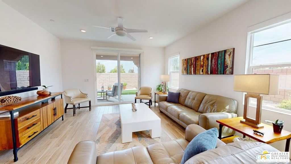 This almost 3 year old home, with "Owned Solar", is ready for its next owner. In Dolce, a community featuring both two-story and one-story homes, includes this great 3 Bedroom 2 Bath single level home. Beautiful features throughout including high ceilings and a Gourmet Kitchen for any "chef" enthusiast. It's an open concept area with a large island - quartz, of course, but the way it is laid out, it's open to the Great Room and Dining Area - but it is to the side upon entering the home via the spacious foyer. Upon entering the foyer, there is a hall to the right which allows access to the 2nd and 3rd bedrooms and the hall bath with a tub/shower combination. Further ahead along the foyer, the Kitchen is to the left and then a little further to the right are the Dining Area and the Great Room. The Great Room has a slider to the Lanai-like covered patio with custom artificial green space and an ample side yard for a future private spa, spool and/or swimming pool. Fortunately, the community to the east is lower, so when looking over the wall, to the east, all you see are rooftops! Once past the kitchen and across from the Great Room is access to the Primary Bedroom Suite featuring the ensuite bath with dual vanities, a large shower and WC and a large closet - this suite features great views of the rear yard as well. Beyond the Kitchen is access to the laundry room with side by side washer and dryer, a pantry closet and access to the spacious 2 car attached garage. Dolce offers a community area with Pool and Spa and it is close to shopping and entertainment and the future Disney - Cotina. Welcome to your new home!