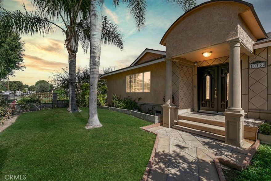 Welcome to Your Private Oasis!
This stunning home truly has it all — a sparkling aqua-blue pool and Jacuzzi, elegant Venetian plaster finishes, and a remodeled kitchen and bathroom designed for modern living.
Beautiful palm trees frame the front yard, giving the property amazing curb appeal. A 1-car driveway complements the detached 2-car garage with alley access — perfect for parking or a potential ADU conversion.
Step through the grand double-door entrance into a space that exudes luxury and comfort. The main living room features laminate flooring, a custom fireplace with detailed moldings, recessed lighting, a glass chandelier, and intricate ceiling designs.
The second living area, ideal as a family or entertainment room, showcases custom tile work, high ceilings, and exposed wood beams, adding warmth and character.
The remodeled kitchen is a chef’s dream — complete with granite countertops, stainless steel appliances, a built-in wine rack, kitchen features space to covert into a cozy breakfast nook perfect for morning coffee. Washer and dryer are included for your convenience.
Bathrooms are tastefully updated with high ceilings, modern tile work, and elegant finishes. Ample storage, including walk-in closets, ensures functionality throughout.
French doors with stained-glass accents lead you to your private backyard retreat, where you’ll find a resort-style pool and Jacuzzi surrounded by multiple water features — the perfect setting for relaxing evenings or unforgettable gatherings.
With its luxurious upgrades, thoughtful design, and ADU potential, this home offers a rare combination of beauty, comfort, and investment opportunity.