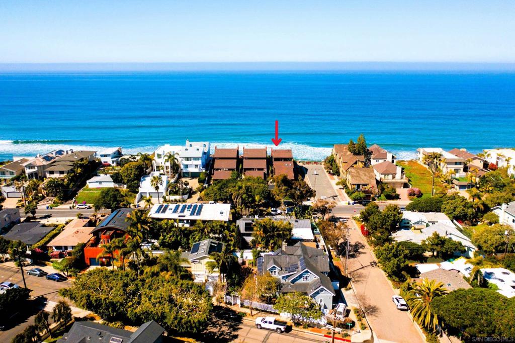 Rare Oceanfront Duplex in Leucadia – Welcome to 194 Neptune Avenue! Discover unmatched coastal living at this oceanfront residence in Encinitas’ most sought-after neighborhood. With unobstructed panoramic views of the Pacific Ocean offering magical sunsets, this is a rare opportunity to own beachfront property in one of Southern California’s most vibrant seaside communities. Located in a private six-unit oceanfront enclave, this property offers low HOA dues and an intelligently designed layout featuring a first-floor bedroom and full bath, remodeled kitchen and baths, dramatic vaulted ceilings, abundant natural light, an oceanfront backyard, bonus east-facing balcony ideal for sunrise views, mini-split AC/heating units for year-round comfort, generous attic storage, spa-style soaking tub, & finished one-car garage with two additional parking spaces. Just steps from local coffee shops, restaurants, surf breaks, and sandy beaches, this home offers the quintessential Encinitas lifestyle—laid-back luxury in a walkable coastal setting. Some virtual staging included to help you reimagine the space. Come and tour this oceanfront gem! 1. Unobstructed panoramic ocean views from an almost 400sf backyard patio, 2. (1) Bed and Full Bath with soaking tub downstairs 3. 2 completely remodeled baths (down to studs), see documents tab for list of many upgrades 4. Year-round comfort with upgraded Mini-Split units-AC/Heat 5. Low HOA $250/month 6. Small exclusive enclave of 3 buildings, each w a duplex and a 1 car garage PLUS 2 dedicated guest spaces 7. Duplex layout, no one above or below you and your own garage. 8. High ceilings throughout home and lots of light. 9. Easy beach access via Stonesteps, or Moonlight Beach 9. Bonus east facing private balcony to enjoy purple sunrises 10. Stroll to many cafes, restaurants and shopping. Technicolor sunrises and sunsets!