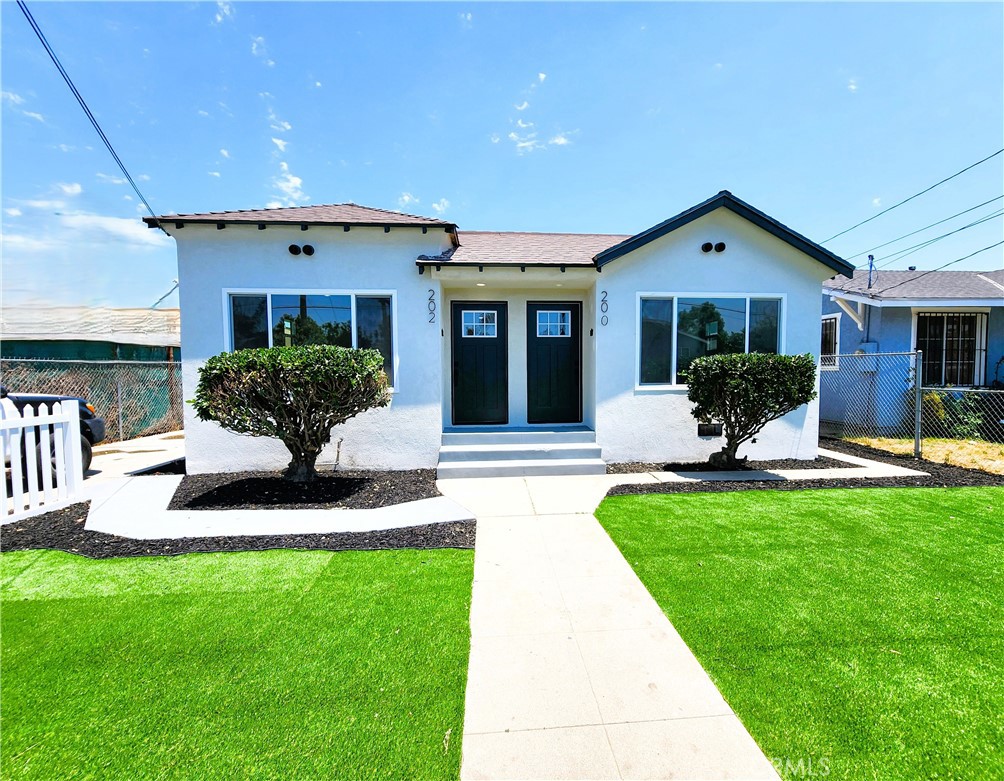 Beautiful, Immaculate, and Newly Remodeled Duplex on a Huge Lot!! Plenty of Room to add an ADU! Just about everything is NEW! New Exterior Stucco! New Exterior & Interior Doors! New Interior Paint! New Waterproof Luxury Vinyl Plank Flooring! New LED Recessed Lighting! New Shaker Style Kitchen Cabinets! New Quartz Counters! New Stainless Steel Workstation Sinks! New Stainless Steel Range Hoods! New Mini-Split Air Conditioners with Remote Controls! Mini-Splits are also Heaters! New Bathroom Vanities! New Bathroom Mirrors/Medicine Cabinets! New Bath Tubs! New Tile around the Tub! New Toilets! New Laundry Hookups! New White Vinyl Fence in the Front Yard and Backyard! New Artificial Grass that Stays Green and does not need Watering! New Plumbing, Supply Lines & Sewer! New Electrical Wiring, Including Circuit Breaker Panels! Super Long Driveway that Leads to a Two Car Garage and a Single Car Garage! Plenty of Cars can Fit on the Driveway and Even More in the Backyard! As a Home Buyer you can Live in One and Rent Out the Other Side to help make the payment! As an Investor get Ready to Rent this out for Big Bucks for the upcoming World Cup and Olympic Games! Walking distance to Church, Shopping, Restaurants and Wilson Park! This Duplex should NOT need any repairs for Years!