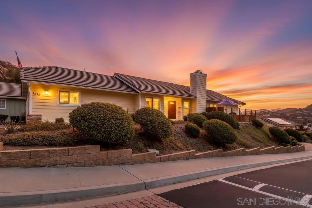 Singing Hills VIEWS! This one story, 2 bedroom, 2 bath, 2 car attached garage home with vaulted ceilings is located on elevated private corner lot. Tastefully upgraded with granite & tile counters, wood & tile floors, modern shower surrounds, indoor laundry w/ cabinets, stainless steel appliances, open floor plan, breakfast bar, fireplace with mantle, roomy master bed & bath suite, & 3 doors leading from house to wrap around backyard patio area & VIEWS! Tons of storage cabinets in oversized garage too! PLEASE SEE SUPP.... ....Low HOA pays for trash, pool, spa, park, front yard maintenance, RV parking & owners can reserve community areas for birthdays & gatherings!