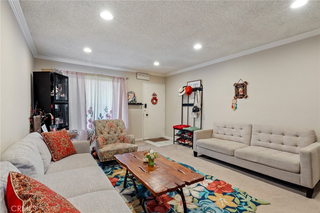 Welcome to 330 N. Howard Street #201, a bright and inviting 2-bedroom, 1-bathroom condo nestled in one of Glendale’s most desirable neighborhoods. This charming second-floor unit offers 873 square feet of well-designed living space, perfect for comfortable everyday living or entertaining guests. As an exterior unit, it benefits from an abundance of natural light and enhanced privacy, with lovely views of the surrounding neighborhood that can be enjoyed from the comfort of your own private balcony. Step inside to a warm and welcoming interior that features a spacious living room with seamless access to the balcony, creating the perfect indoor-outdoor flow. The adjacent dining area and efficient kitchen provide a cozy and functional layout, ideal for both quiet meals at home and entertaining friends. Both bedrooms are generously sized with ample closet space, while the full bathroom is conveniently located to serve both residents and guests. One of the standout features of this unit is its proximity to the community pool—just steps away—making it easy to enjoy sunny afternoons lounging poolside. Whether you're taking a dip or simply relaxing in the sun, this amenity adds an element of resort-style living to your everyday routine. Located in a well-maintained building with all utilities included in the HOA dues, lush landscaping and secured entry, this home offers a wonderful balance of comfort, convenience, and community. Positioned near popular shopping, dining, and entertainment options, as well as easy access to freeways and public transportation, 330 N. Howard Street #201 is a perfect opportunity for first-time buyers, downsizers, or investors looking to own a piece of prime Glendale real estate. Don’t miss your chance to call this lovely condo your new home.