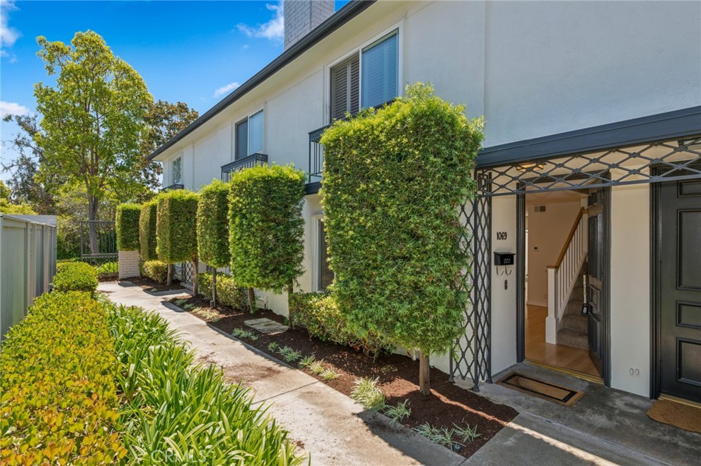 Nestled in the heart of Newport Beach, just moments from the best coffee shops, restaurants, grocery stores, shopping, fitness centers, and scenic nature trails that 17th Street has to offer, this Dover Village condo truly has it all. The inviting main level features laminate flooring, a cozy fireplace, and an open-concept kitchen that flows seamlessly into the dining area. Step outside to a sun-drenched private patio—perfect for morning coffee or evening relaxation. A convenient guest powder room and in-unit laundry complete the first floor. Upstairs, you’ll find two spacious bedrooms, including a primary suite with dual closets and abundant storage. The Jack-and-Jill bathroom offers modern touches and functionality. A newly painted interior provides a fresh finish throughout. Dover Village offers residents access to a sparkling pool and a private clubhouse, all within a well-maintained community. This turnkey home is move-in ready and perfectly positioned to enjoy the best of Newport living.