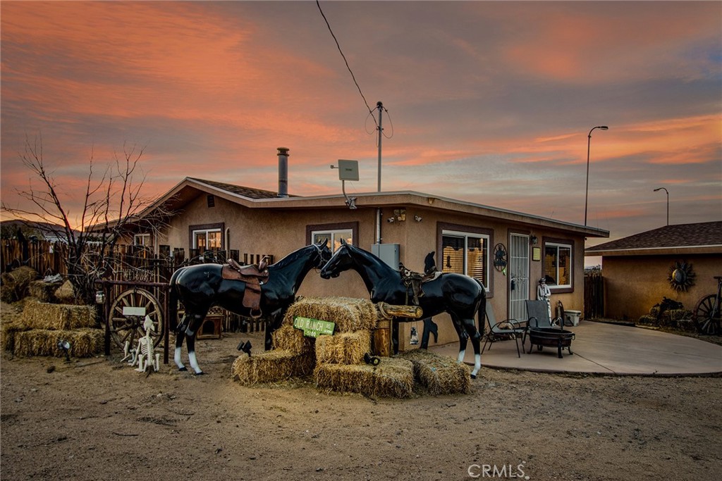 Eligible for a USDA loan with No Money Down! Welcome to “Desert Born Ranch” located on 2.5 acres in peaceful Landers, a relaxing Desert Oasis.The home offers a Nice 2 Bedroom, one bathroom with an inviting Open Kitchen layout great for spending time with family and friends. Perfect HOME from the crowded city or a great INCOME Producing property and offers RV Hook-Ups with water and electricity. This property is Fully Furnished and READY to start Producing Income as a Short Term Rental. It has a Ranch Style Theme with Unique Character. Enjoy watching the desert sunrises and sunsets here everyday while listening to a serene and peaceful environment. Relax in the Jacuzzi while enjoying the quiet starry nights. This property comes Fully furnished with "Western Vintage" throughout the home, includes all of the appliances. Excellent location this property is able to provide a feeling of seclusion and complete privacy, while also offering quick and easy access to the main roads. It is conveniently located about 20 minutes from Yucca Valley and a variety of local amenities such as Goat Mountain, Pioneertown, Pappy and Harriets, The Integratron, Giant Rock, Gubler Orchids, La Copine, Johnson Valley OHV and Joshua Tree National Park.