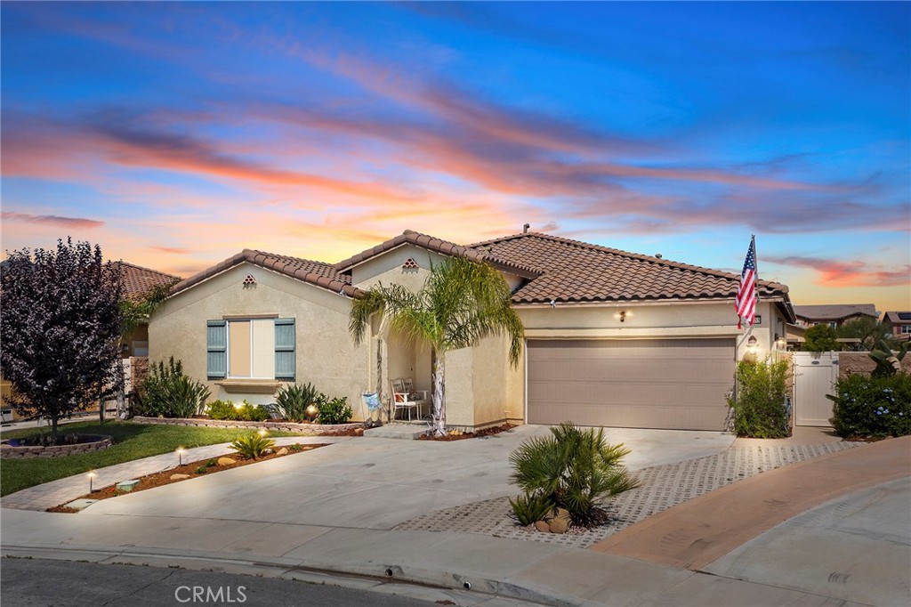 This gorgeous, turnkey, single story, 3 bedroom, 2.5 bath, solar powered home with mountain views can be the home of your dreams. You can spread out in just under 2500 square feet and soak in loads of natural light. That along with the neutral custom paint colors, flooring, and open floor plan contribute to the airy and calming flow. Upgrades galore! In the kitchen you will appreciate the stainless steel appliances, upgraded lighting, fixtures, tile backsplash, granite counters, and a huge island that can seat six comfortably. Don't overlook all the cabinets for storage. There are so many special accents and touches that take this home from basic to extraordinary. Like the electric fireplace with mantle and hearth that gives heat, raised garden beds, and luxurious bathrooms. Take advantage of the bonus room that could easily serve as a den, office, or 4th bedroom. The covered patio with fan provides much sought after shade on those warm, sunny days and provides the perfect place to bask in the serenity of the trickling fountains. This backyard was made to relax and enjoy your coffee in the morning or entertain, especially around the firepit. You can even operate the lights and fountains while inside the house. The three car tandem garage is an added bonus. Close to shopping and entertainment. Don't wait to make this house your home!