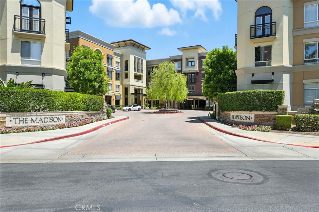Welcome to this move-in ready 2-bed, 2 bath condo at The Madison in the heart of Valencia! This home features brand new carpet, an open floor plan, private balcony and in-unit laundry. The spacious primary suite includes a walk-in closet and en-suite bath while the second bedroom and full bathroom provide ideal accommodations for guests, family, or a home office setup. Enjoy resort style living with pool, spa, fitness center, clubhouse & theater room. Gated parking and secure entry. Just steps from dining, shopping and entertainment at Valencia Town Center. Easy freeway access.