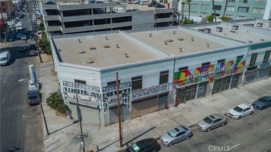462 – 472 E 4th St in Los Angeles, CA 90013 is a commercial two story commercial building constructed in 2007, featuring approximately 16,800 square feet of building area on an estimated 0.25 acre lot. The property has 4-units that are currently occupied. One of the units is owner occupied. Zoned LAM2, this property resides within Los Angeles’s Toy District, a densely commercial sub neighborhood known for extensive wholesale trade in toys, novelties, electronics, decorations and party goods.