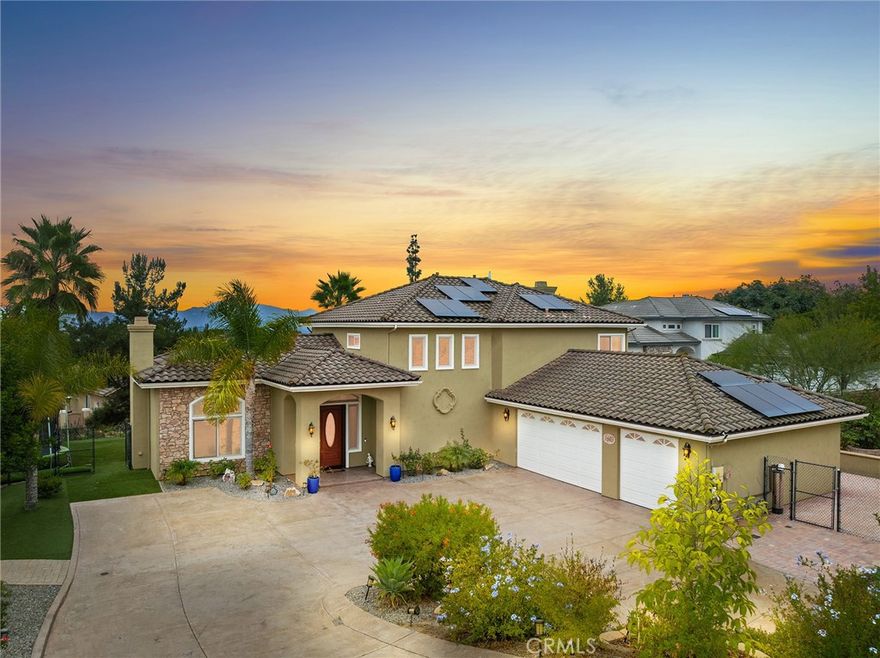 Welcome to your private retreat in one of Escondido’s most desirable communities! This stunning residence showcases high-end upgrades throughout, designed for both elegance and comfort. From the moment you arrive, the modern stamped concrete driveway and low-maintenance paver accents set the tone for the contemporary yet warm style of this home. A 3-car garage with an upgraded AC unit plus potential RV or boat parking offers plenty of flexibility for all your lifestyle needs. Step inside to discover an open, modern layout with custom touches everywhere. The family and living rooms are wired for surround sound, complete with smart wall switches for seamless control of indoor and outdoor lighting. The chef’s kitchen is a dream, featuring luxury finishes and perfect flow for entertaining. The primary suite feels like a five-star retreat, complete with spa-style en suite bathroom and a custom walk-in closet system designed for organization and style. This home is not only beautiful but efficient, with paid-off solar panels, tankless water heater, and a whole-house water filtration system. Outdoors, enjoy the extended paver patio with a stylish gazebo, perfect for entertaining or quiet evenings under the stars. Surrounding the property are fruit trees including mango, guava, cherry, citrus, lime, and avocado—your very own orchard. Additional upgrades include a walk-in wine fridge, modern lighting, and thoughtful storage solutions throughout. Every detail has been considered to create a home that balances luxury, technology, and convenience.

Whether entertaining guests or enjoying peaceful mornings, this home offers the perfect combination of comfort and sophistication—all in a private, sought-after community in Escondido.