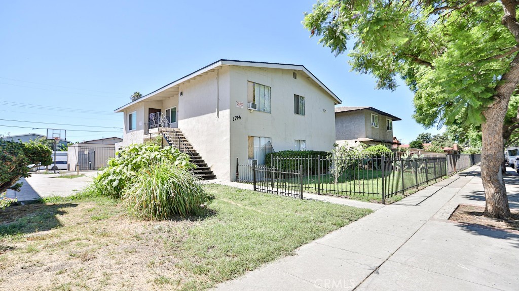 Greate opportunity for long term income. This single building structure four-plex offers 2 units up and 2 units down, all unites are identical. Each unit comes with 2-Bedroom, 1-Bathroom. Property has new roof, new water proof decking, new paint on fence. Enclosed garage with 4 parking spaces. Easy access to 55 and 5.