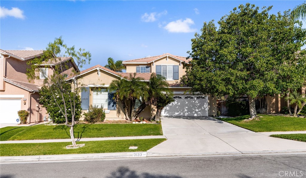 Welcome to the highly sought-after Mountain Gate community! This wonderful family home offers a spacious and flexible layout with a downstairs office that could easily be converted into a bedroom and a convenient guest half bath. Upstairs features three comfortable bedrooms and a versatile loft area—perfect for homework, play, or a media space. The primary suite provides a relaxing retreat with a private ensuite bathroom, while the secondary bedrooms share a convenient adjoining bath. Recent updates include exterior paint (2020), a new hot water heater, all new windows, shutters, toilets, and shower doors (2021), plus a Nest thermostat and a new programmable garage door opener (2024). Enjoy low taxes and a prime location close to top-rated schools, parks, shopping, dining, and easy freeway access to the 15 and 91—making this an ideal place to call home.