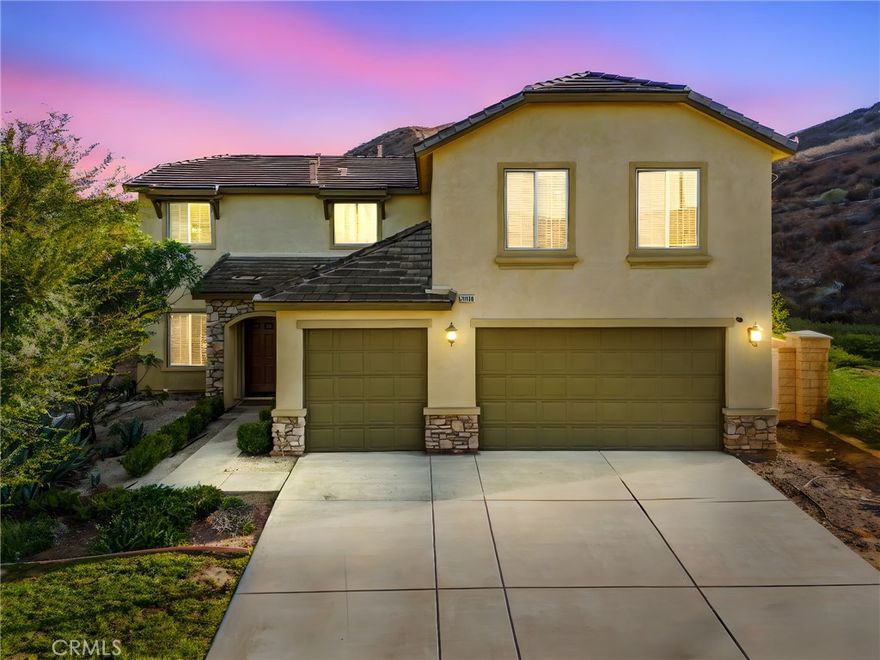 Welcome to 34140 Ambrosia Ct – a beautifully maintained home in one of the safest and most sought after communities in all of Lake Elsinore – the Canyon Hills community. Offering over 3,100 sqft. of living space on nearly a quarter acre, this corner lot home sits on a quiet cul-de-sac right next to a park combining space, privacy, and a true neighborhood feel. This property is PRICED TO SELL making it an incredible opportunity for buyers seeking both value and lifestyle. Step inside to discover a spacious and flexible floor plan perfect for family living. The main level includes a full bedroom and bathroom, ideal for guests, in-laws, or a private office. The open concept kitchen features granite countertops, stainless steel appliances, and plenty of cabinetry, flowing effortlessly into the dining and living areas. Ideal for entertaining and family gatherings. Upstairs, enjoy a huge loft that can serve as a home office, a children's playroom, a media room, or a home theater. The primary suite and additional bedrooms are all generously sized, offering comfort and versatility for every member of the family. Convenient upstairs laundry adds to the functional design. The backyard is a blank canvas, ready for the new owner to design a dream outdoor oasis whether that’s a pool, garden, or covered patio for California style living. The three car garage and extended driveway provide ample parking and storage. Located just minutes from the 15 and 215 freeways, this home offers easy commuter access and is close to shopping centers, restaurants, and top rated schools. Enjoy all that Canyon Hills has to offer such as resort style amenities including multiple pools and spas, parks, sports courts, baseball fields, and scenic walking trails throughout the community. Don’t miss your chance to secure this great deal and opportunity in one of the most desired communities in all of Lake Elsinore!