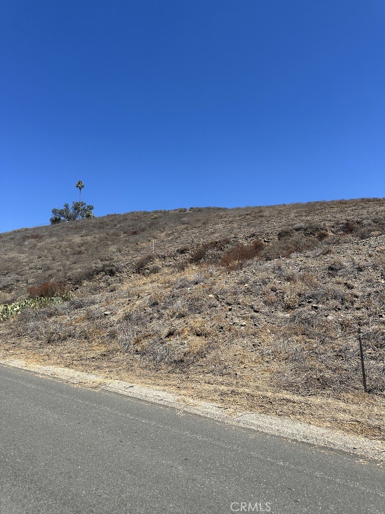 Prime opportunity in Menifee, one of the fastest-growing cities in Riverside County! This 1.34-acre parcel is positioned near the corner of Beverly Dr and Juanita Dr. The lot faces south with views of nearby mountains, foothills, and neighboring communities from the street level. The lot's gentle upslope offers the potential to create a homesite pad higher on the property- ideal for preserving privacy and maximizing the tranquil views. Conveniently situated on the Beverly Dr. paved road with water and power available nearby making this lot ideal for custom build or a long-term investment.
Buyer to verify all zoning, utilities, setbacks, and development potential with the City of Menifee and County of Riverside.