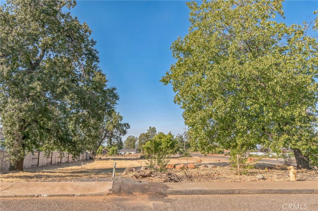 In a desired community in the sought after Lower Paradise. A community of 22 lots for high end homes. Construction on several lots in in progress and some have been rebuilt and occupied. This is a large corner lot at the intersection of Starlight and Neal Road. Septic appears to be in good condition with 1500-gallon Concrete tank installed January 4, 2011. Please do your own due diligence.