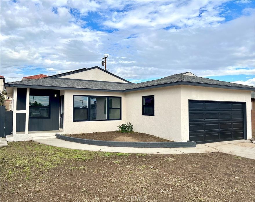 Elegantly remodeled, this home spared no detail inside or out, boasting undeniable curb appeal in the ever-thriving city of Carson. This holiday season, home shopping is about to get exciting with this move-in-ready, 3-bedroom, 2-bathroom, 1,682-square-foot home showcasing an open-concept layout filled with abundant natural light from large dual-pane windows with the addition of recessed lighting throughout. The beautifully upgraded kitchen features sleek quartz countertops, a stylish tile backsplash, and stainless steel appliances. Just off the kitchen is a spacious walk-in pantry that connects directly to the laundry room for added convenience. The thoughtfully designed floor plan highlights a generously sized primary suite with two closets—a large walk-in and a traditional wall closet—along with a sliding glass door that opens to a brand-new deck overlooking the backyard, creating the perfect retreat for rest and relaxation. Additional upgrades include a brand-new HVAC system with central A/C, updated plumbing, and solar panels—offering both comfort and energy efficiency for years to come. And with its spacious 2-car attached garage, convenience is built right in. Don’t miss the opportunity to make this beautifully remodeled home yours—schedule your private showing today and experience it in person!