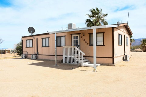 Photo of 71647 Indian Trail, 29 Palms, CA 92277 (MLS # 219147862DA)