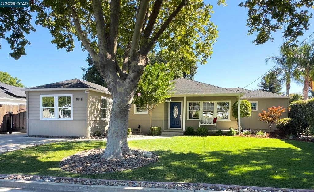Welcome to this beautifully updated single-level home on a charming tree-lined street. This rare, turn-key opportunity has a thoughtfully designed floor plan offering comfort and functionality. The open-concept kitchen seamlessly connects to the spacious living area filled with natural light. With four generously sized bedrooms, all with Elfa and custom closet storage, this home offers ample space for guests or a dedicated home office. The expansive primary suite is a true retreat, complete with a walk-in closet and a newly renovated en-suite bathroom adorned with custom tile work. Gleaming hardwood floors, new LED lighting, and double-paned windows enhance the home's bright and welcoming ambiance. An indoor laundry room provides convenience and extra storage. Step outside to your private, gated backyard oasis. Relax under the gazebo for al fresco dining, enjoy the lush low maintenance turf lawn and fruit trees, or gather on the patio. Upgrades include a new sewer lateral, newly updated primary bathroom, new paint, lighting and more. Conveniently located just minutes from the highly acclaimed Monte Gardens Elementary School and all the amenities Concord has to offer. Visit 1818Granada.com/mls