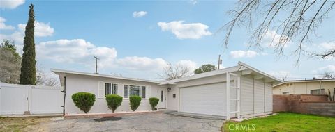 Photo of 706 Woodgate St, Lancaster, CA 93534 (MLS # RS26003497)