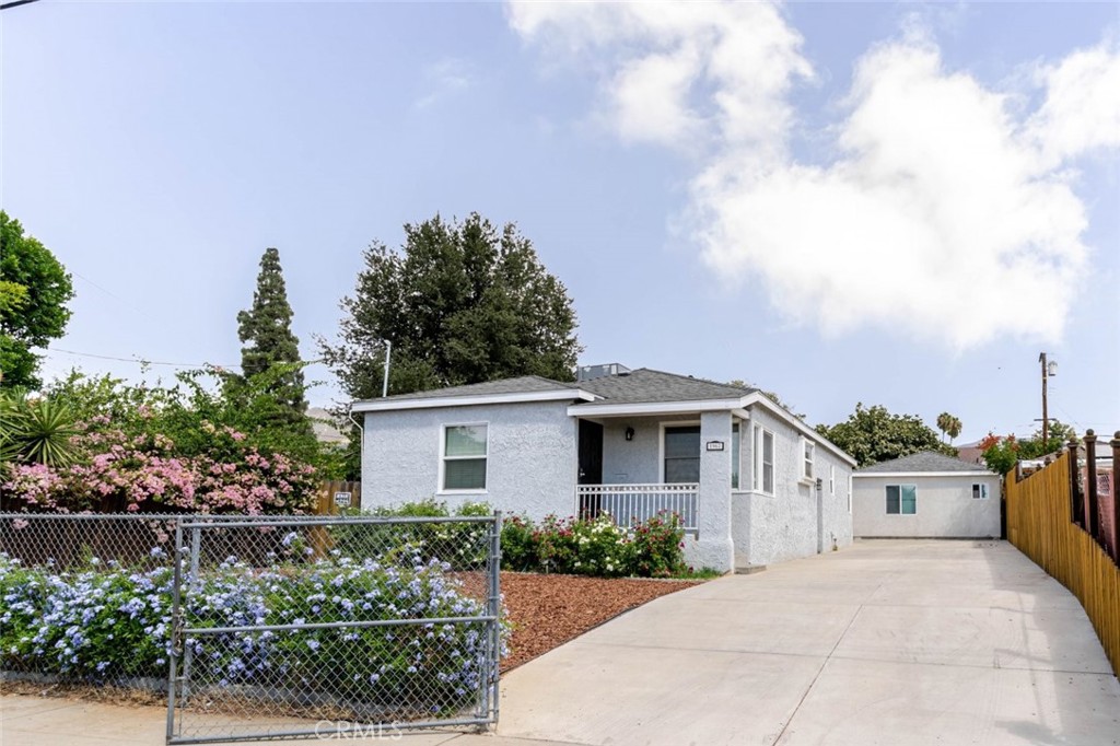 Welcome to 1967 8th Street in San Fernando, offering 3 bedrooms, 2 bathrooms, and 1208 square feet of modern living space on a 6741 square foot lot. This thoughtfully designed home is paired with a fully permitted ADU under the same APN at 1965 8th Street, with Certificate of Occupancy issued. The ADU provides 352 square feet with 1 bedroom, 1 bathroom, a living and dining area, and a kitchen with new stainless steel appliances, making it ideal for extended family, guests, or rental income. The ADU is gated and includes its own private yard, offering added privacy and flexibility.
The property features a lush backyard filled with fruit trees and a large side yard perfect for outdoor dining or a quiet sitting area. Recently landscaped front and rear yards enhance curb appeal, while parking is abundant with space for more than six vehicles.