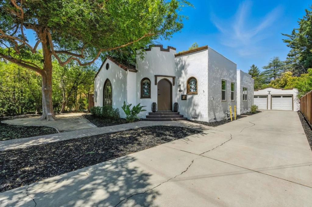 Spanish Charmer Completely Updated! This Home is Like New with All of the Original Charm Intact! This Home is the Cutest! Updated Gourmet Kitchen, Master Suite, Second Bathroom Added with Permits, New Windows, New Electrical, New Plumbing, New Interior Doors, Designer Floors and Paint Upgraded, Inside Laundry Room, New Lights, Custom Fireplace in Living Room, Yards & Patio Space all Redone! Rear Yard is Spacious and Private! All Documentation is Available! This Home was Done Right and is Really Nice!