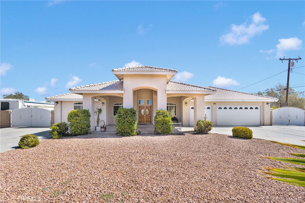 BEAUTIFUL !!!!!! Spacious 5-Bedroom Ranch on Nearly 1 Acre with RV Access & Entertainer’s Backyard!
Built in 2007, this 2,875 sq ft single-story home offers 5 bedrooms, 3 full baths, vaulted ceilings, hardwood floors, a large open kitchen with double ovens, tile roof, and a 3-car garage. The circular driveway flows through a charming front drive-up porch. Enjoy a fully fenced lot with wrought iron and block fencing in front for curb appeal, and wood fencing in back for privacy. Concrete driveway extends to the backyard with RV parking access. Entertain under the permitted wooden gazebo with electrical, built-in gas BBQ, pizza oven, flat stovetop, and storage shed.