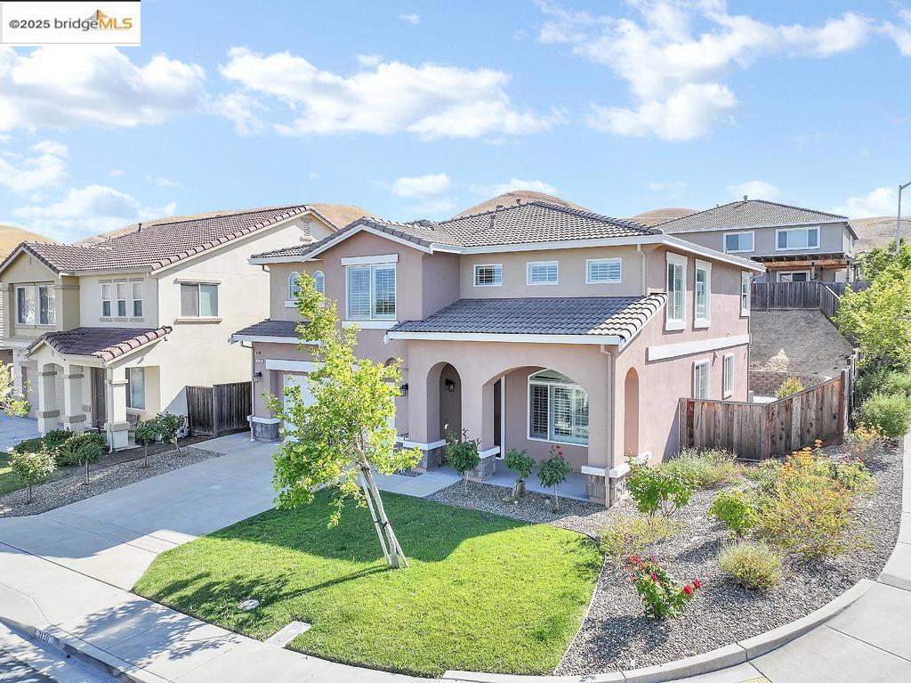 Welcome to 3021 Rio Viejo Dr—a beautifully refreshed 5-bedroom, 3-bathroom home offering over 2,700 sq ft of comfortable living in a sought-after Bay Point neighborhood. Fresh interior paint, updated cabinetry, and brand-new carpet create a bright, inviting atmosphere that’s move-in ready. The main level features a versatile bedroom and full bath—ideal for guests or multi-generational living—plus a formal dining room perfect for gatherings. The open-concept kitchen and family room serve as the heart of the home, providing a seamless space for everyday life and entertaining. Upstairs, you’ll find generously sized bedrooms and a private primary suite, offering the perfect retreat at day’s end. The low-maintenance backyard is ready for relaxing weekends, gardening, or hosting friends. Additional highlights include a 2-car garage, no HOA, and unbeatable convenience with nearby BART, Highway 4, shopping, and parks. This home is the perfect blend of space, comfort, and location—come see it today!