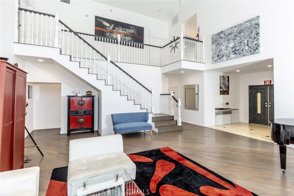 This spacious 4-bedroom, 5-bathroom home offers 3,555 square feet of comfortable and elegant living in a sought-after neighborhood. Thoughtfully designed for both everyday living and entertaining, the home features a large living room with a fireplace, a separate dining area, and a bonus family room perfect for gatherings. High ceilings, natural light, and recessed lighting create a bright and welcoming atmosphere throughout.
The full-size kitchen flows seamlessly into the living spaces, while a designated laundry room adds everyday convenience. Each bedroom includes a walk-in closet and an en suite bathroom, offering privacy and comfort for all. The expansive primary suite stands out with a wide balcony overlooking the backyard and direct access to the home's private retreat.
Outdoors, enjoy a sparkling pool and hot tub surrounded by mature landscaping and a generous patio area, ideal for relaxing or hosting guests. This well-located home is close to local amenities, shopping, and dining, combining space, style, and functionality in one exceptional offering.