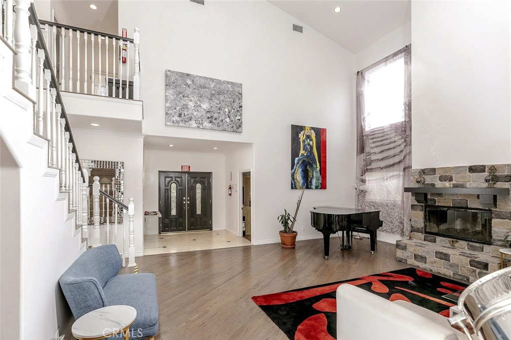 This spacious 4-bedroom, 5-bathroom home offers 3,555 square feet of comfortable and elegant living in a sought-after neighborhood. Thoughtfully designed for both everyday living and entertaining, the home features a large living room with a fireplace, a separate dining area, and a bonus family room perfect for gatherings. High ceilings, natural light, and recessed lighting create a bright and welcoming atmosphere throughout.
The full-size kitchen flows seamlessly into the living spaces, while a designated laundry room adds everyday convenience. Each bedroom includes a walk-in closet and an en suite bathroom, offering privacy and comfort for all. The expansive primary suite stands out with a wide balcony overlooking the backyard and direct access to the home's private retreat.
Outdoors, enjoy a sparkling pool and hot tub surrounded by mature landscaping and a generous patio area, ideal for relaxing or hosting guests. This well-located home is close to local amenities, shopping, and dining, combining space, style, and functionality in one exceptional offering.