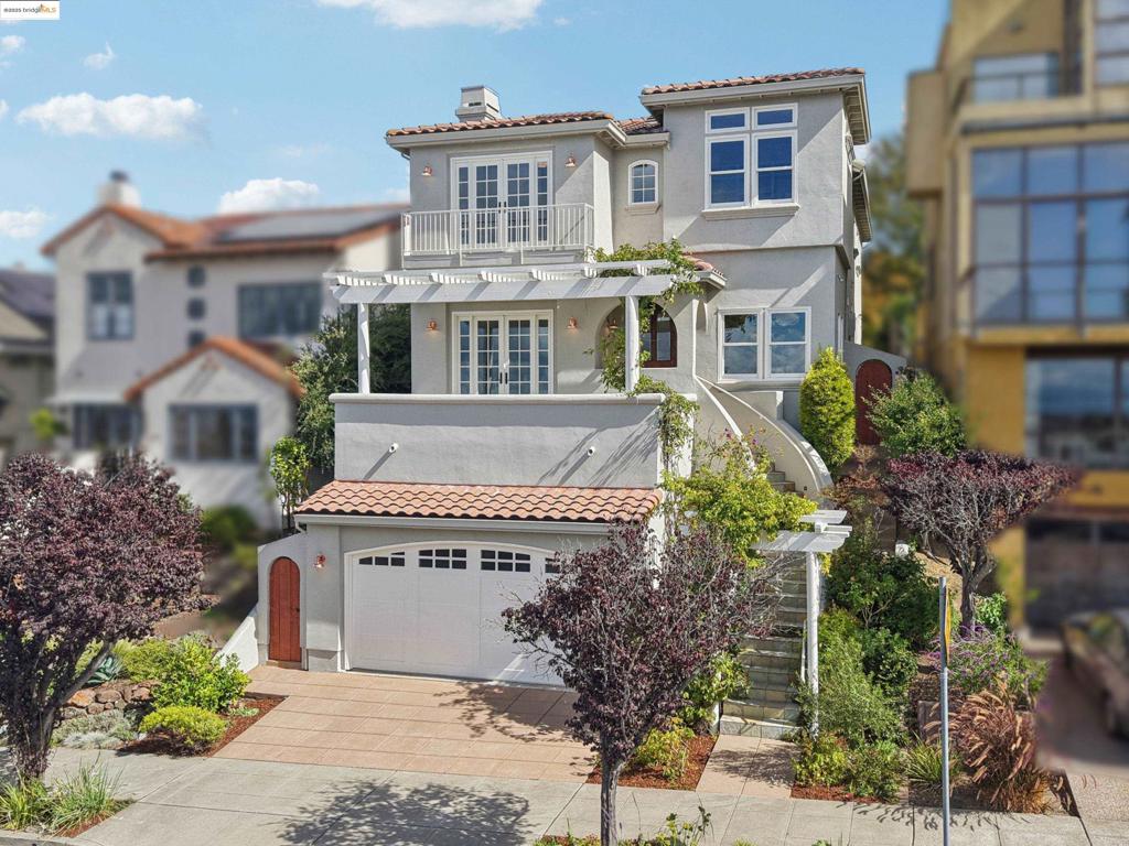 Custom Upper Rockridge Residence with sweeping San Francisco Bay views; Designed and built in 1996, this stunning Mediterranean-inspired home blends timeless character with thoughtful design; A garden pathway leads to a foyer and fireside living room opening to a front deck with breathtaking sunsets; The elegant dining room features a convenient passthrough to the chef’s kitchen, complete with abundant prep space, premium appliances, and everything needed to bring culinary creations to life; The adjoining family room flows to a home office (or potential 4th bedroom), each opening seamlessly to a lushly landscaped, level-out backyard with hill views - ideal for al fresco dining and entertaining; Upstairs, the primary suite captures dramatic Bay views and includes a private library; Two additional bedrooms with “Jack & Jill” bath, and a laundry/storage area complete the upper level; Perched above Sunflower Path in an A+ location, the home offers commanding outlooks while being just minutes to College Avenue and Montclair Village, with convenient access to Rockridge BART and Highways 13 & 24; Zoned for top-rated Hillcrest School (TK-8), this is a rare opportunity to enjoy elevated living in one of Oakland’s most coveted neighborhoods.