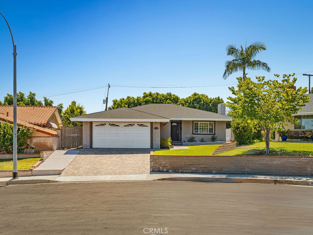 Welcome to this beautiful 3 bedroom, 2 bathroom home nestled on a quiet cul-de-sac in the sought after Miralest Pines neighborhood of San Pedro. Offering 1,544 sq ft of thoughtfully designed living space on an expansive 8,000+ sq ft lot, this home blends comfort, style, and functionality. Step inside to discover elegant travertine flooring throughout and a warm, inviting fireplace perfect for cozy evenings. The large primary suite serves as a private retreat, featuring a fully remodeled master bathroom. Two additional generously sized bedrooms offer plenty of space for family, guests, or a home office. Outside, enjoy California living at its finest in the gated backyard, complete with a lush grassy area and a built in outdoor kitchen, perfect for weekend barbecues and gatherings. The 2 car attached garage provides convenience and additional storage. Located close to parks, shopping centers, and dining, this home offers the perfect balance of peaceful living and urban accessibility.